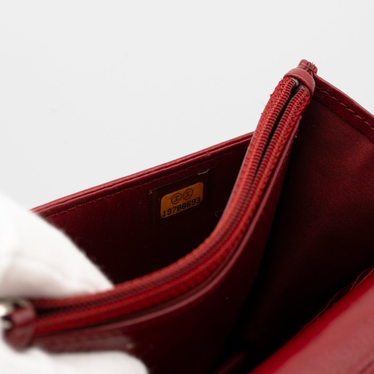 CHANEL Dark Red Camellia Embossed WOC Lambskin SHW A47421