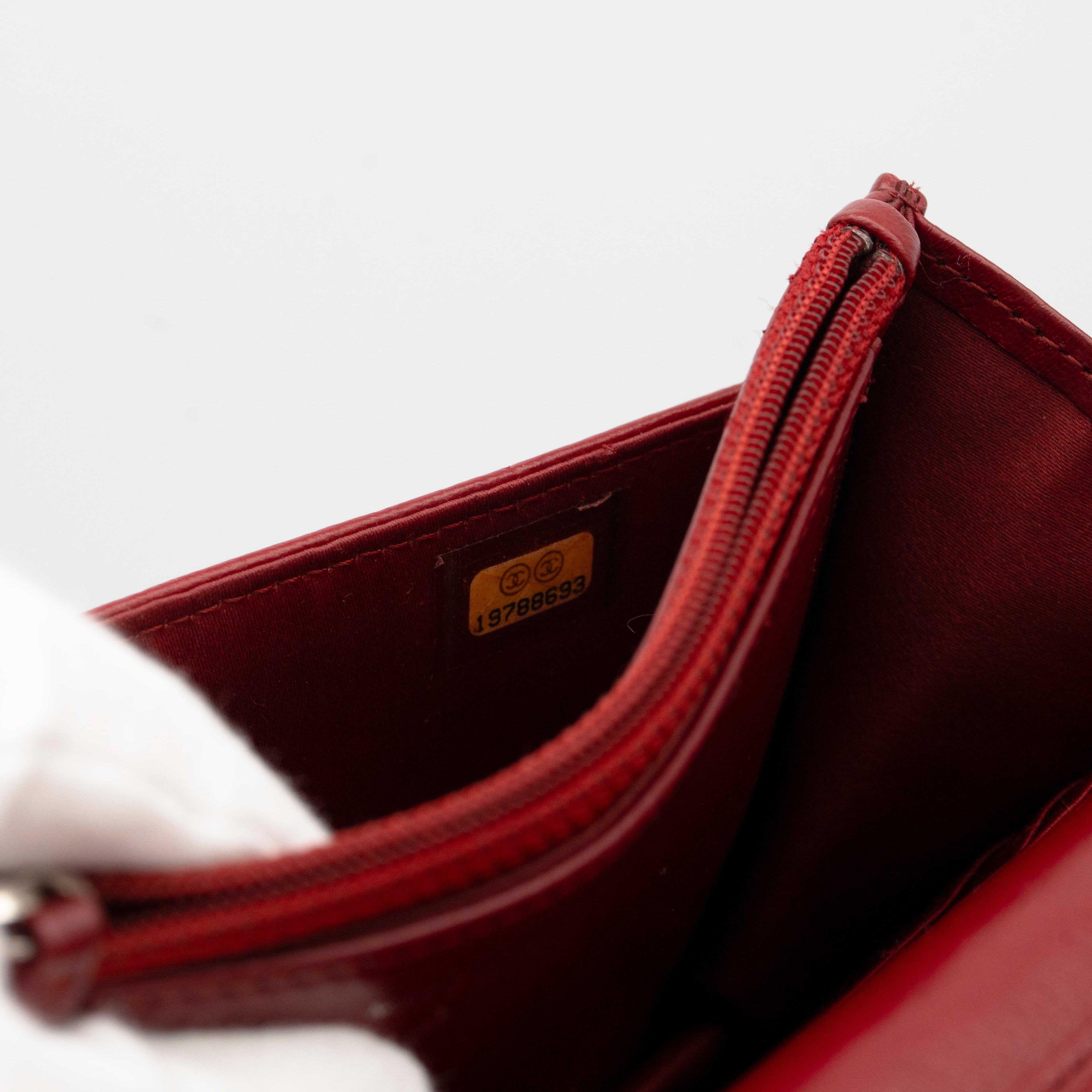 CHANEL Dark Red Camellia Embossed WOC Lambskin SHW A47421